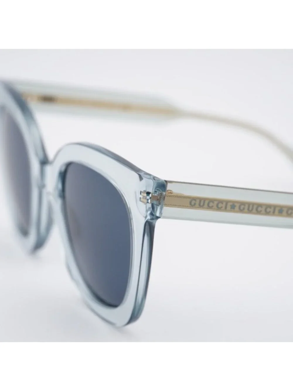 Gucci GG0564S 003 Sunglasses Light Blue Cat Eye Frame, Blue Lenses